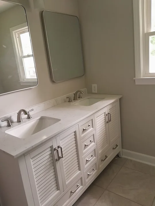 Bathroom vanity and mirror in a small bathroom