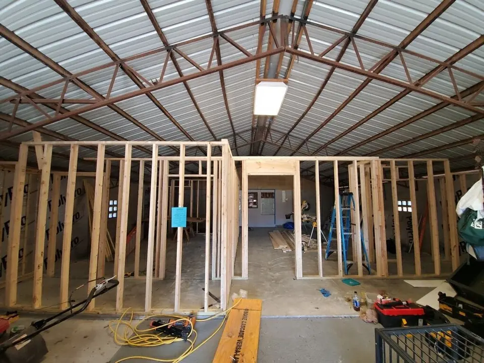 Interior wall framing inside a large shop structure